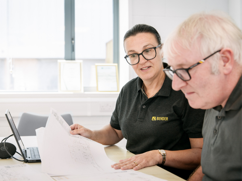 Engineers working on projects at the desk 