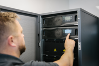 Image of a Bender engineer maintaining a UPS system