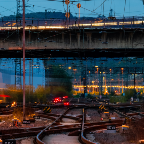 Image of train on track with signals and alternative track routes.