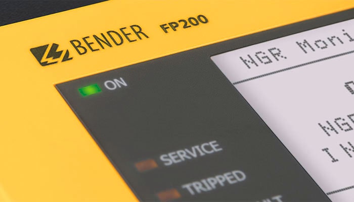 Close-up image of a Bender NGRM (Neutral Ground Resistance Monitor) displaying detailed measurements of ground resistance for electrical system monitoring.