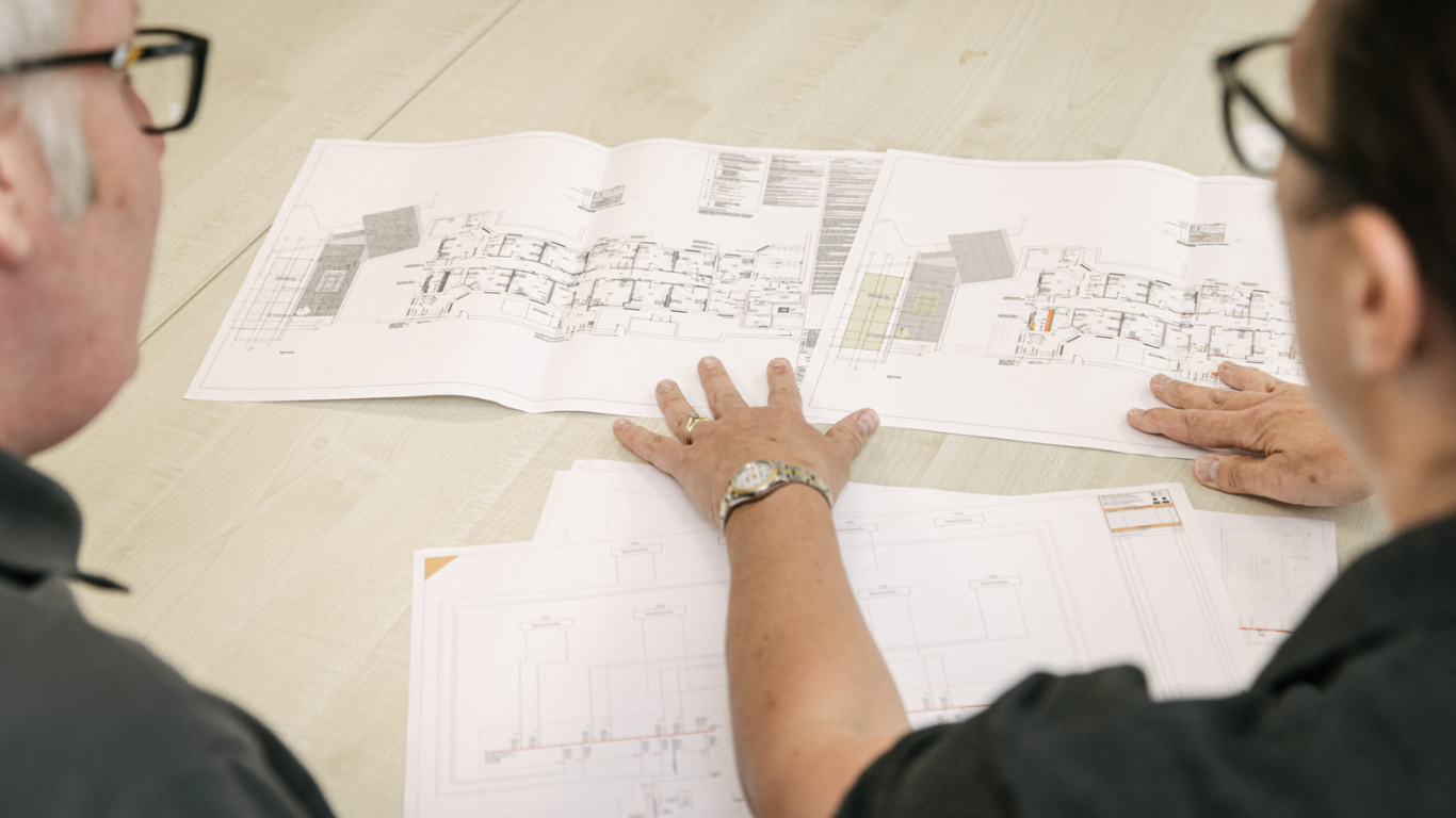 Hospital team planning out a hospital build