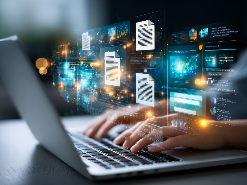 Digital IT team working on laptop 