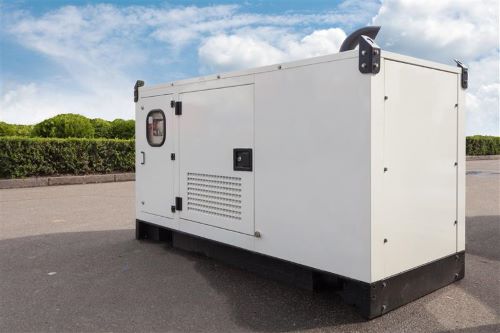 Image of a mobile power generation unit mounted on a trailer, featuring an enclosed generator system.