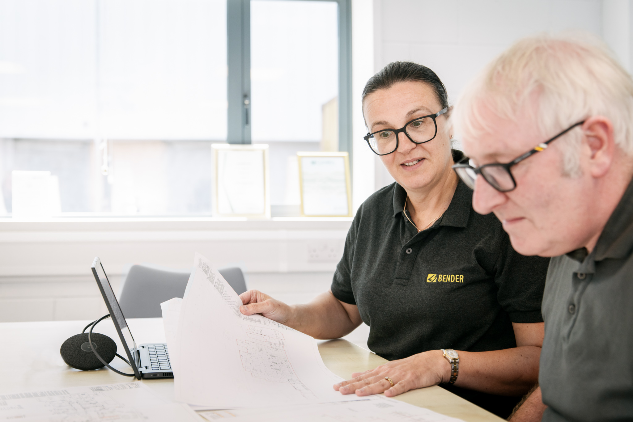 Image of Bender engineer showing CAD drawings